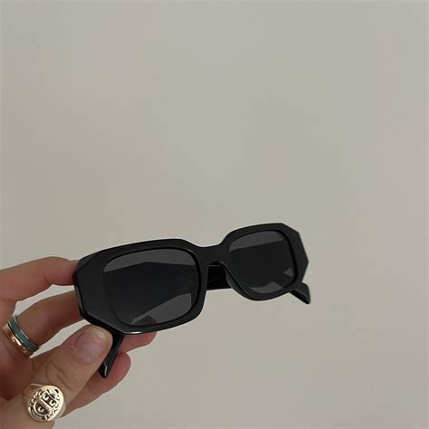 prada sunglasses logo rubbing off